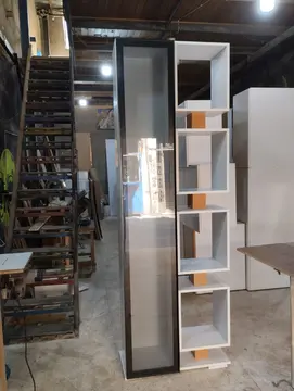Dressing Room: illuminated dressing room cabinetry and glass doors (view 2)