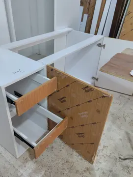 Storage Units: cabinet in the making with visible drawer construction (view 9)