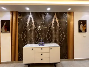 Timber Wall Cladding: feature wall with timber slats and patterned central panel (view 3)