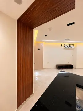 Timber Wall Cladding: timber-clad passage opening beside a kitchen (view 4)